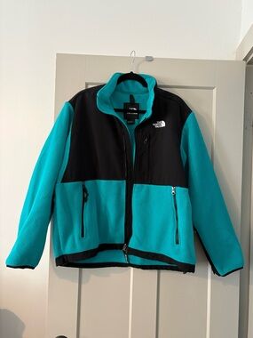 The North Face women’s Turquoise and Black Fleece Jacket